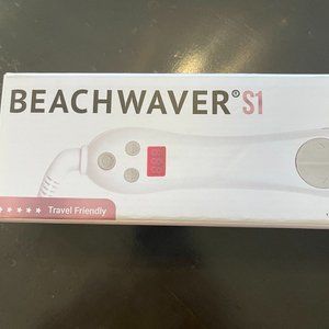The Beachwaver curing iron.